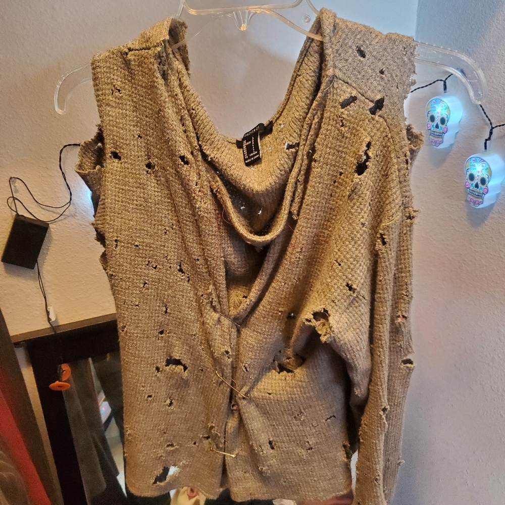 Ripped up and stabbed forever 21 sweater 😋
